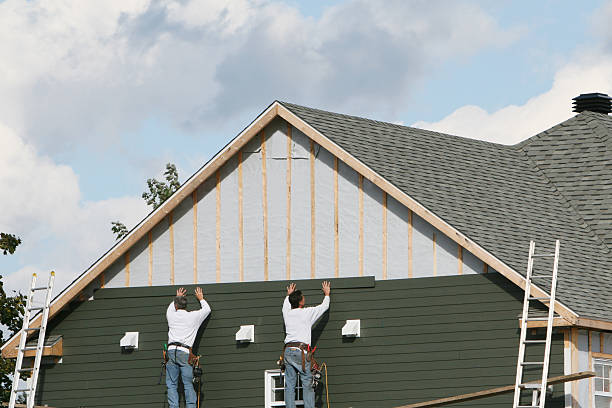 Professional Vinyl Siding technician working in Springdale, NC